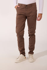 Brown Gabardine Classic Men Pants in a Slim Fit by tomato store, paired with white sneakers.