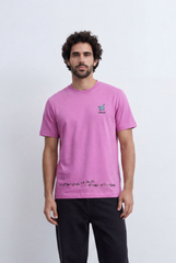 Men’s Chase Graphic Tee in pink by tomato store, featuring a relaxed fit and unique chest print.