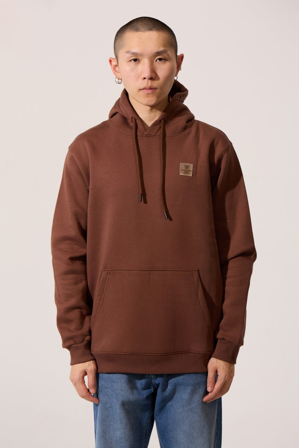 Men’s Elevated Street Hoodie in brown with a slim fit and chest patch by tomato store.