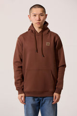 Men’s Elevated Street Hoodie in brown with a slim fit and chest patch by tomato store.