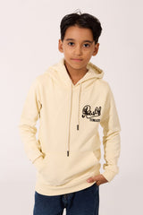 Boy's beige cotton hoodie with black script logo and front pocket by Tomato Store.