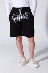 Men’s black raw hem cutoff shorts with a bold white CK9 logo print by tomato store.
