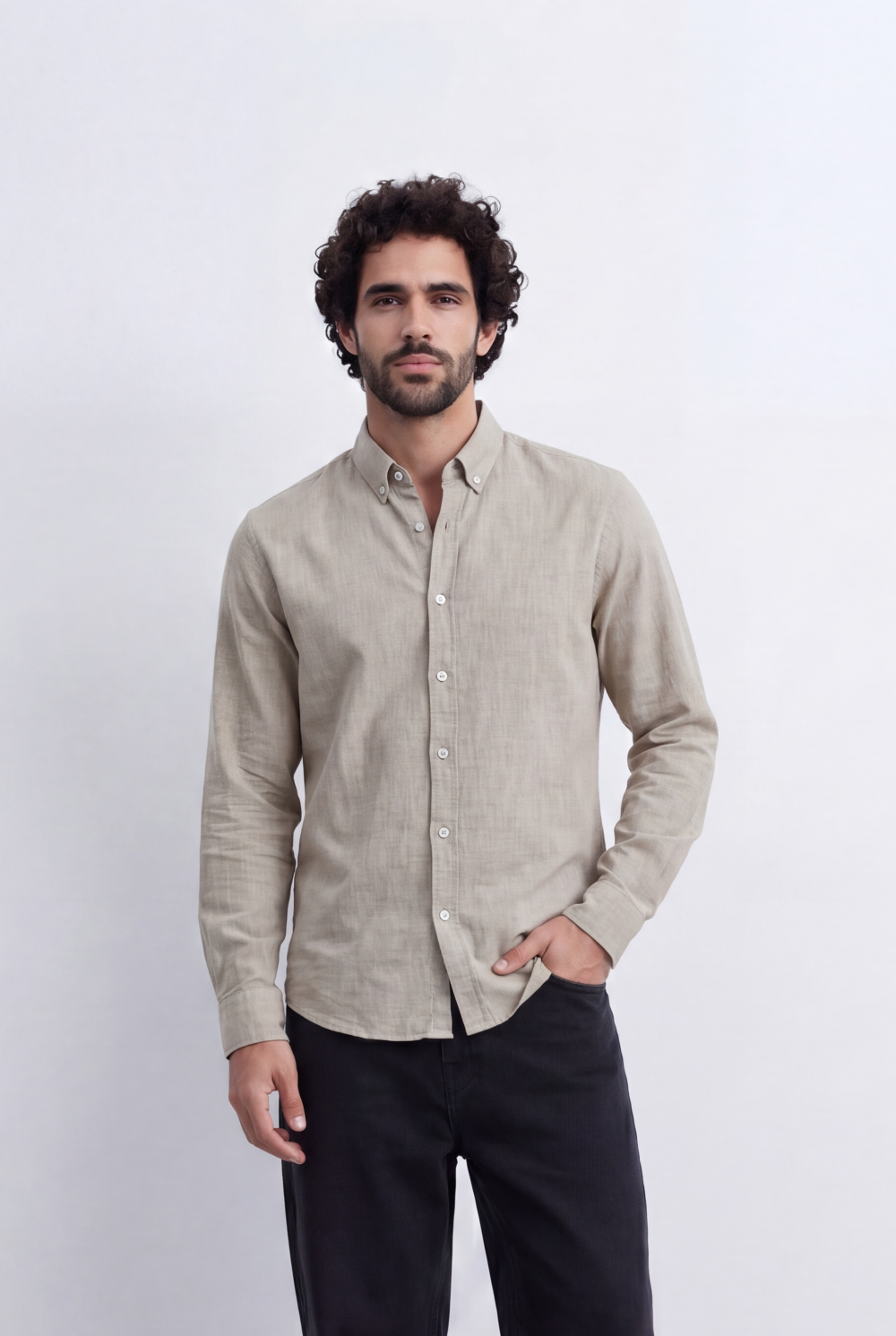 Men's beige linen blend slim fit button down shirt by tomato store, paired with black trousers.