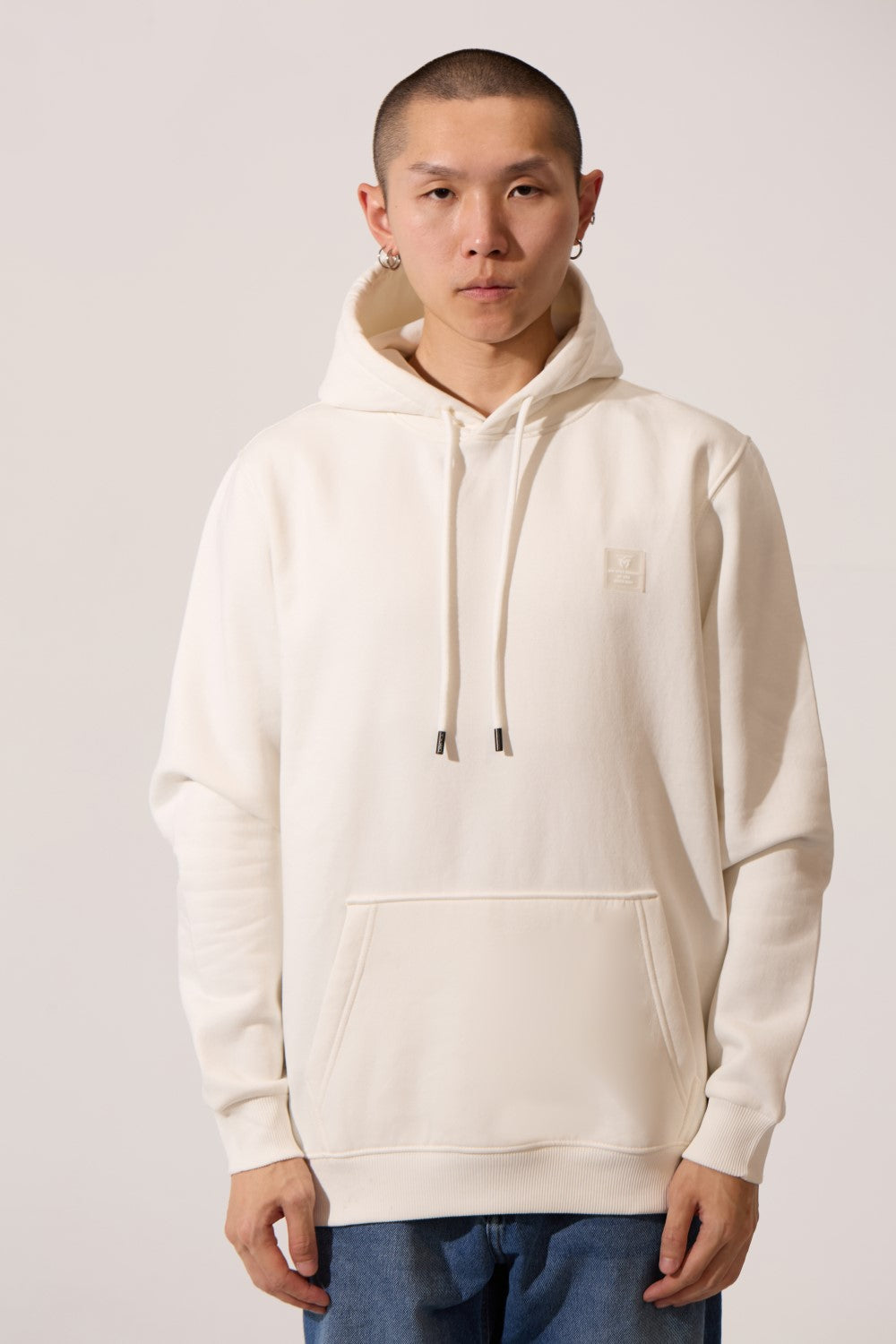 Men’s Kangaroo Pocket Slim Fit Hoodie in white by tomato store, featuring a modern streetwear fit.