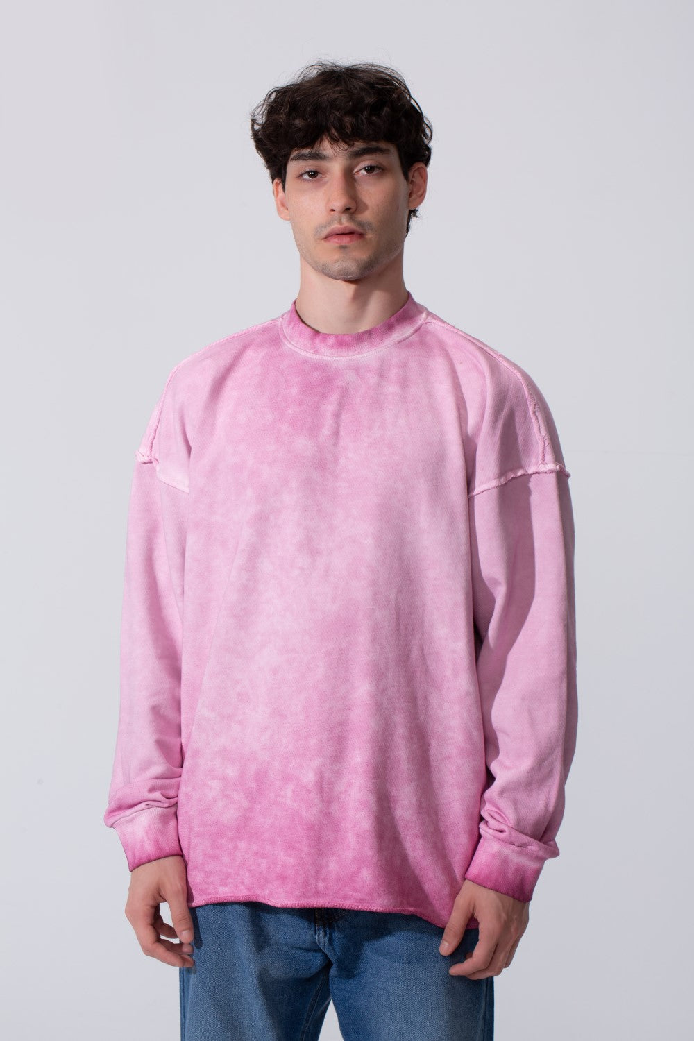 Oversized Men Sweatshirt Garment Dyed in pink with drop shoulders by tomato store.
