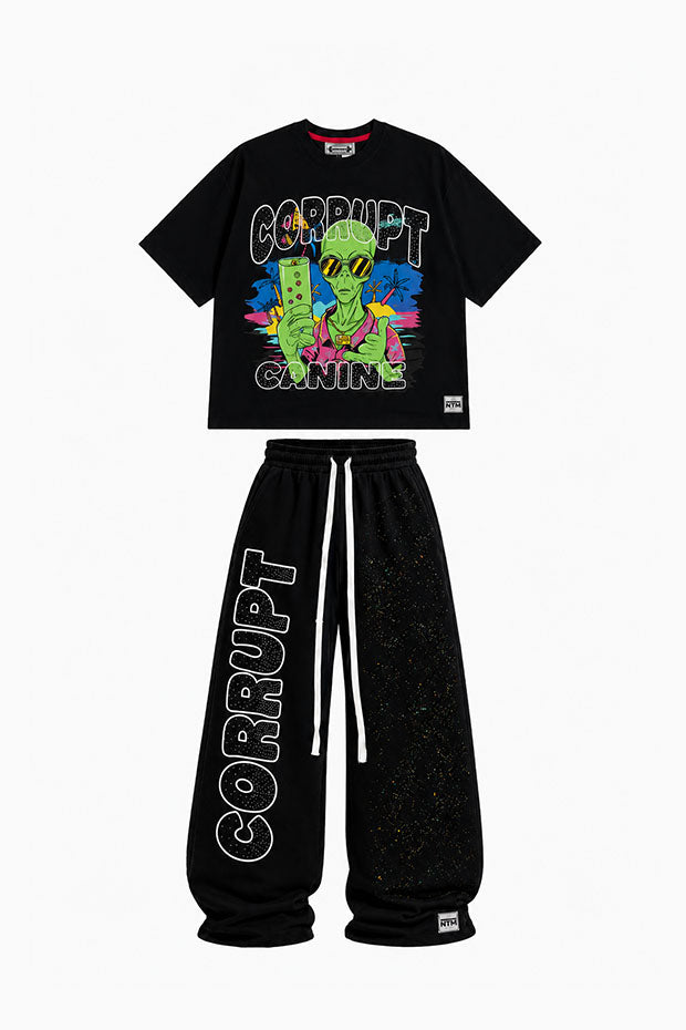 Black graphic t-shirt with an alien holding a drink and black sweatpants with "CORRUPT" printed vertically.